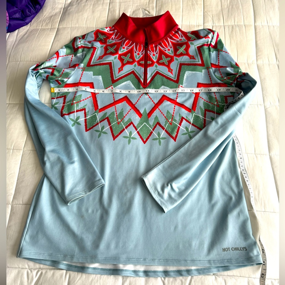 Hot Chilly’s top. Size XL. Pale blue, green and red. NWOT. Nordic design